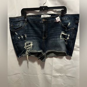 (121) Torrid distressed jean shorts size 24